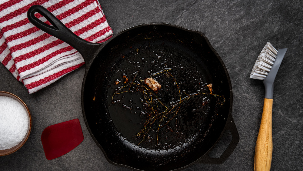 Cast iron skillet and cleaning brush