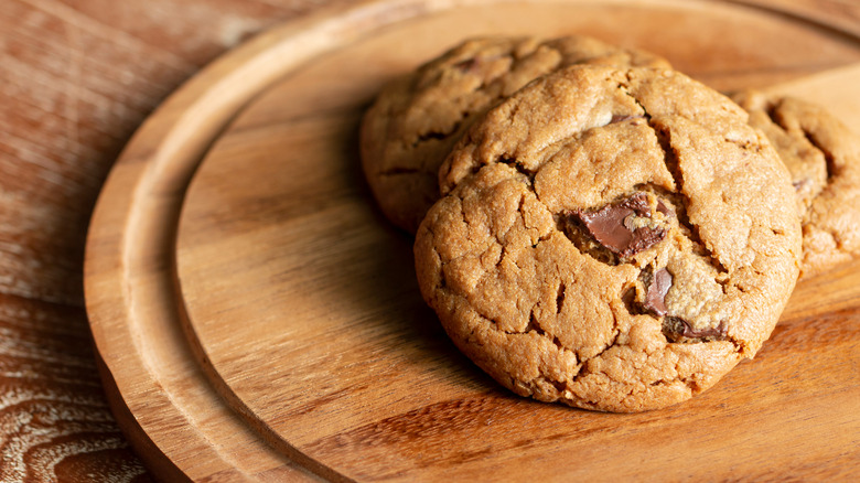 Chocolate chunk cookies on wooden tray