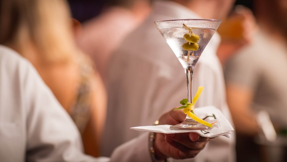 waiter holding a martini