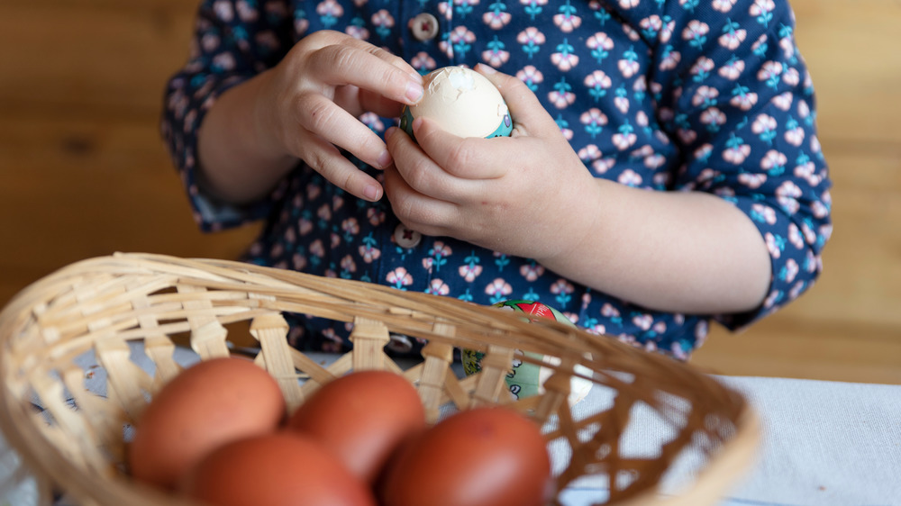 Kid with egg