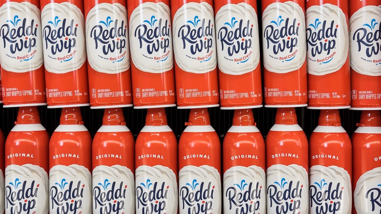 Two rows of red, Reddi-wip cans