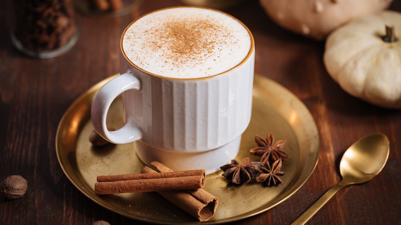 pumpkin spice latte in white mug