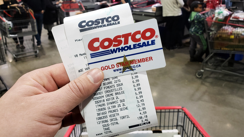 hand holding Costco card