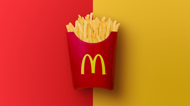 McDonald's fries on red and yellow background