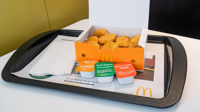German McDonald's chicken McNuggets and sauces on tray