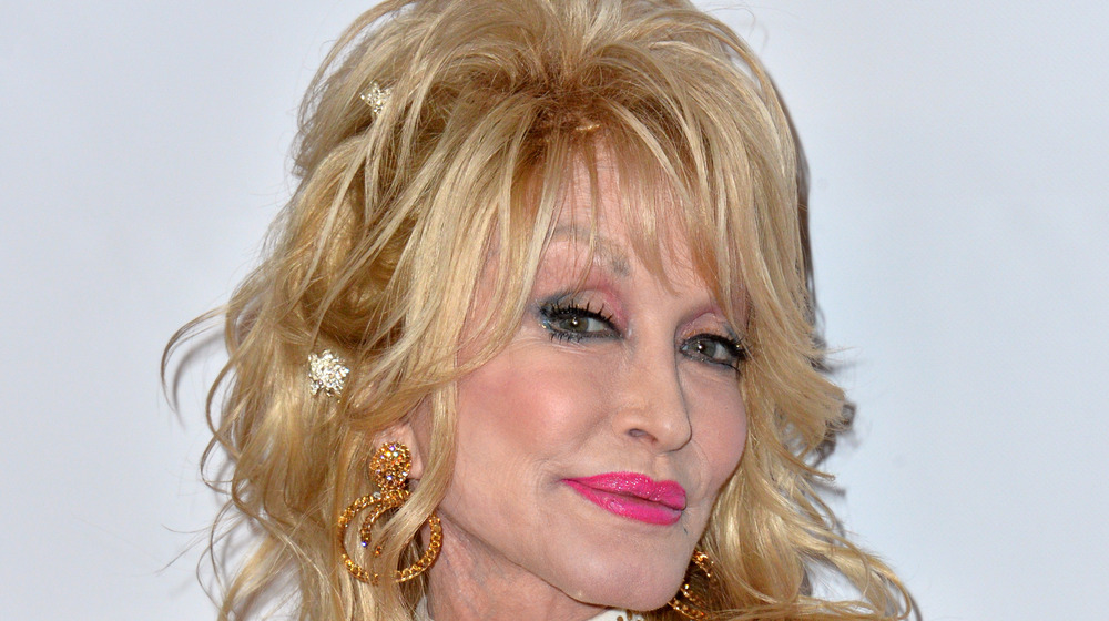 Dolly Parton wearing pink lipstick