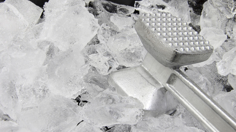Mallet being used to crush ice