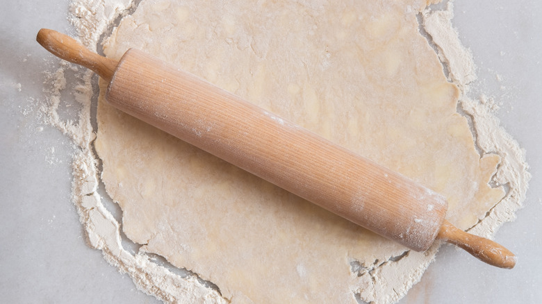 Rolling pin on rolled dough
