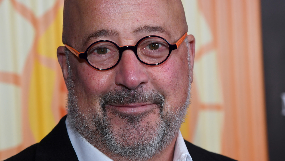 Andrew Zimmern smiling