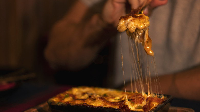 Man eating beefy mac and cheese