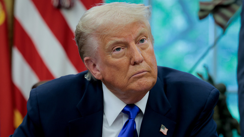 President Donald Trump attending a meeting in the Oval Office