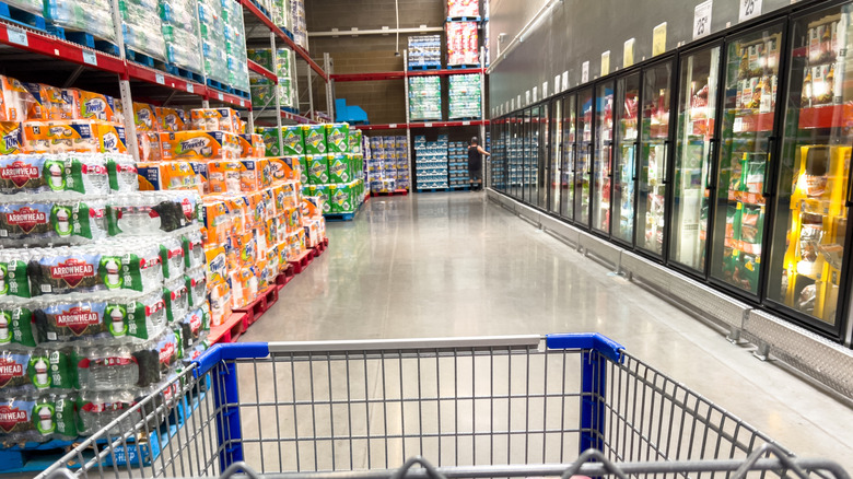 Shopping cart view of mostly empty aisle