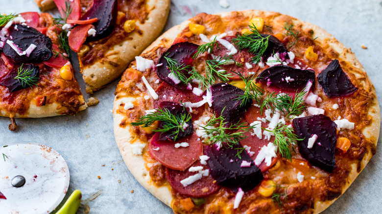 Pizza with beetroot and pepperoni