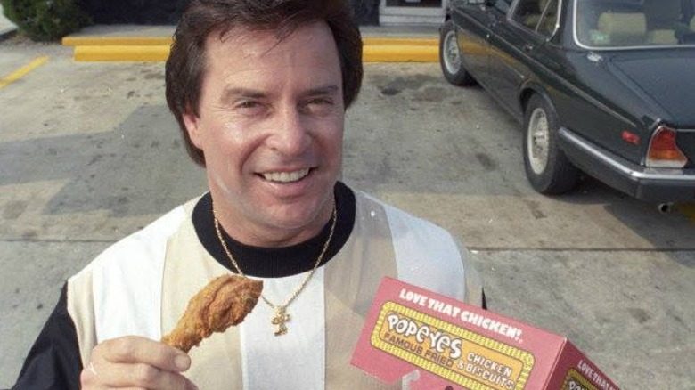 Al Copeland with a box of chicken