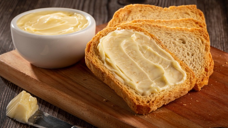 Butter spread thickly on crusty bread