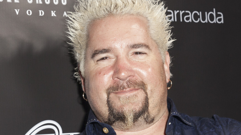 Guy Fieri arms folded