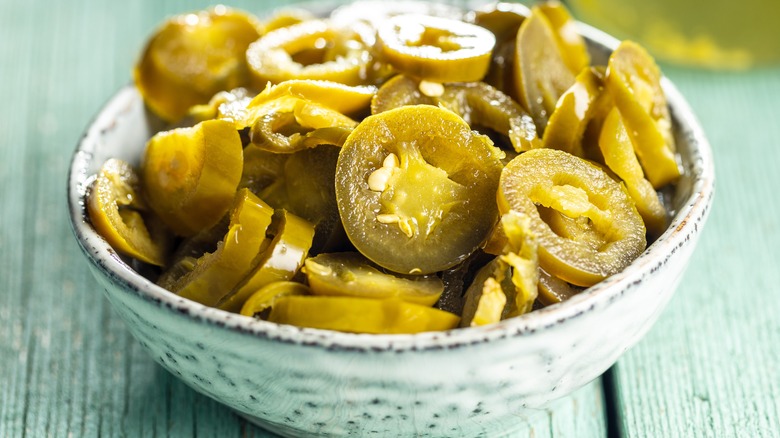 Cut up jalapenos in a bowl