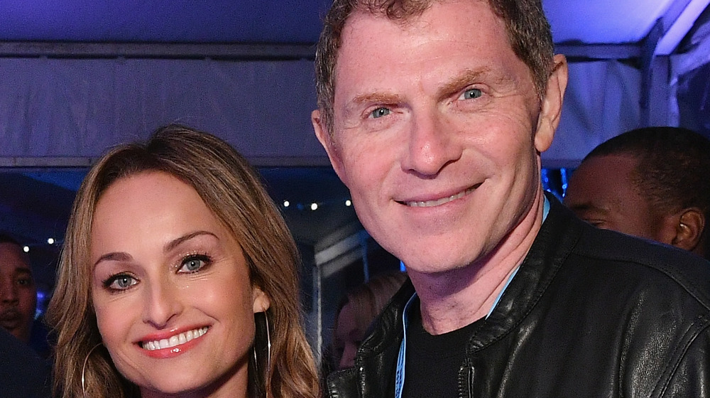 Giada De Laurentiis and Bobby Flay smiling