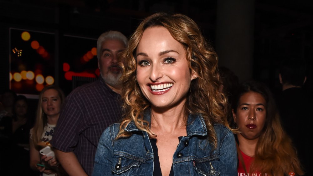 Giada de Laurentiis holding a dish