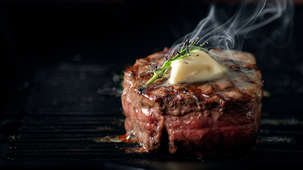 Grilled steak with butter