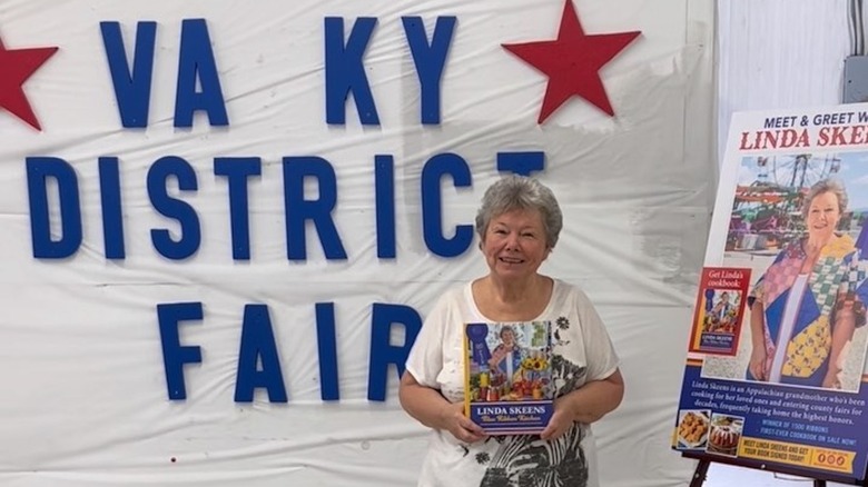 Linda Skeens with book