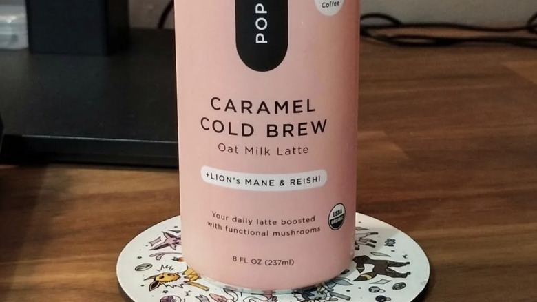 A picture of a can of Pop & Bottle's Oat Milk Latte