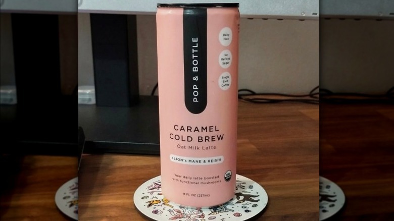 A picture of a can of Pop & Bottle's Oat Milk Latte