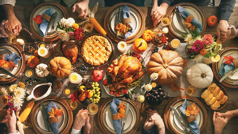 Thanksgiving table with pies and turkey