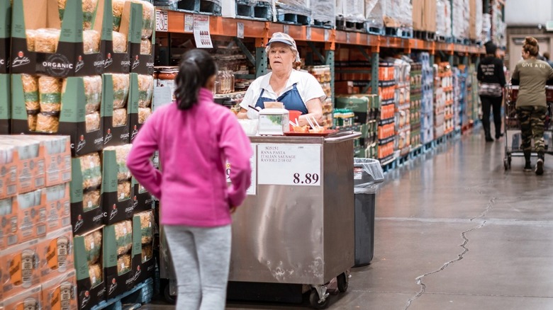 Free sample cart in supermarket aisle