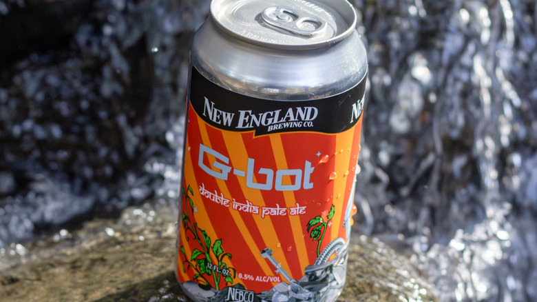 can of G-Bot near waterfall