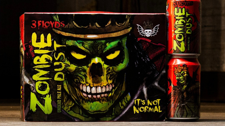 two Zombie Dust cans beside their box