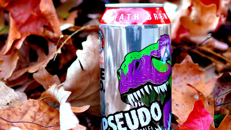 Psuedo Sue can amidst autumn leaves