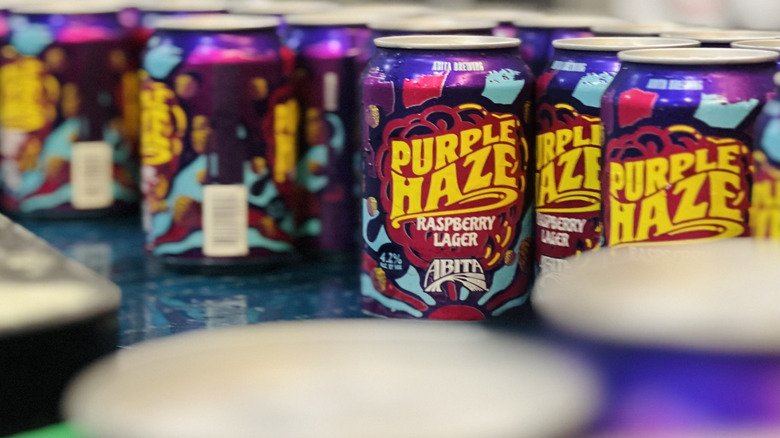 a collection of Purple Haze cans