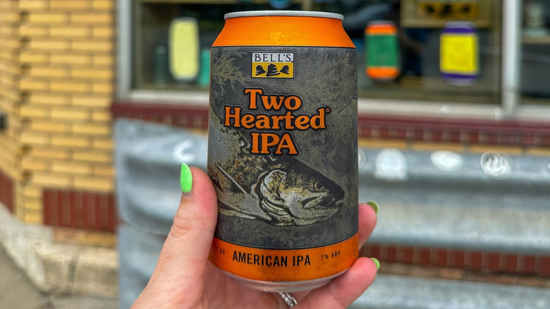 hand holding a Two Hearted IPA can