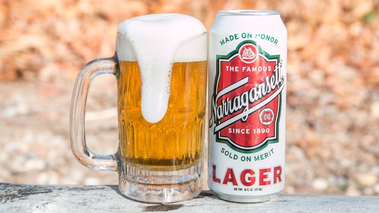 Narragansett Lager can beside full mug