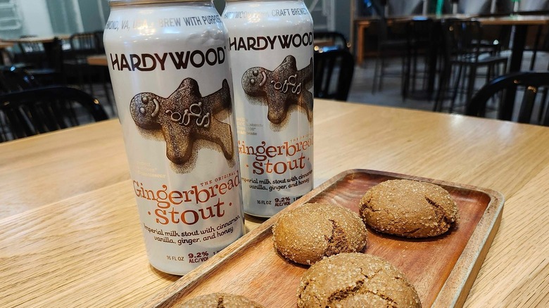 GingerBread Stout cans beside gingerbread cookies