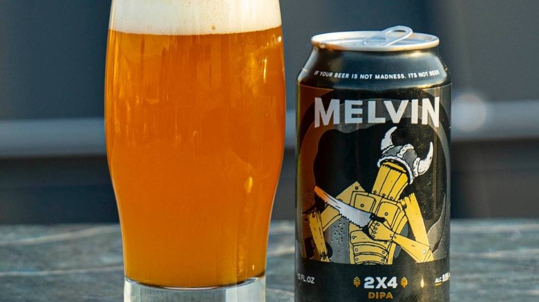 Melvin 2x4 Can beside full glass
