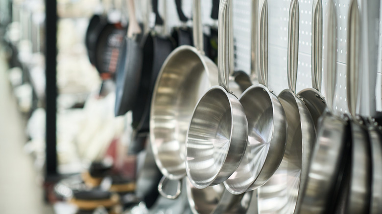 Pans hanging in store
