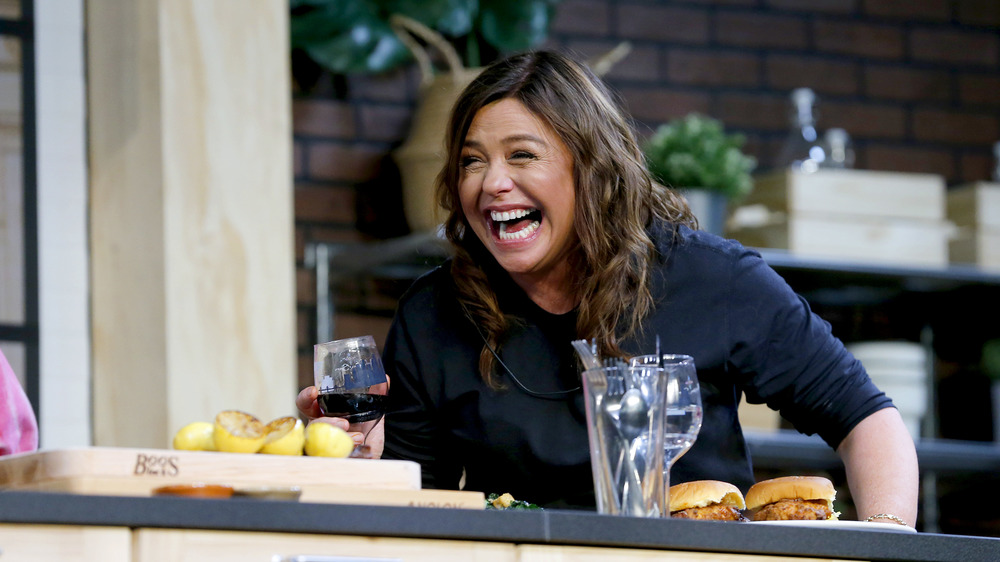 Rachael Ray on a set laughing