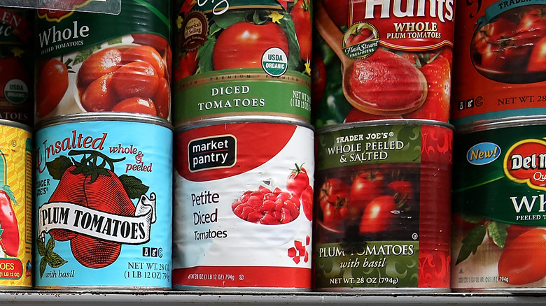 Can of different brands of tomatoes 