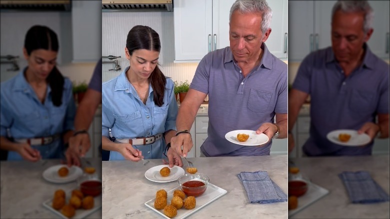 Geoffrey and Margaret Zakarian sampling arancini balls