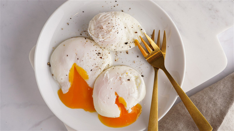 poached eggs on a plate 