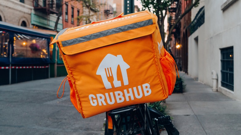 biker with Grubhub delivery bag