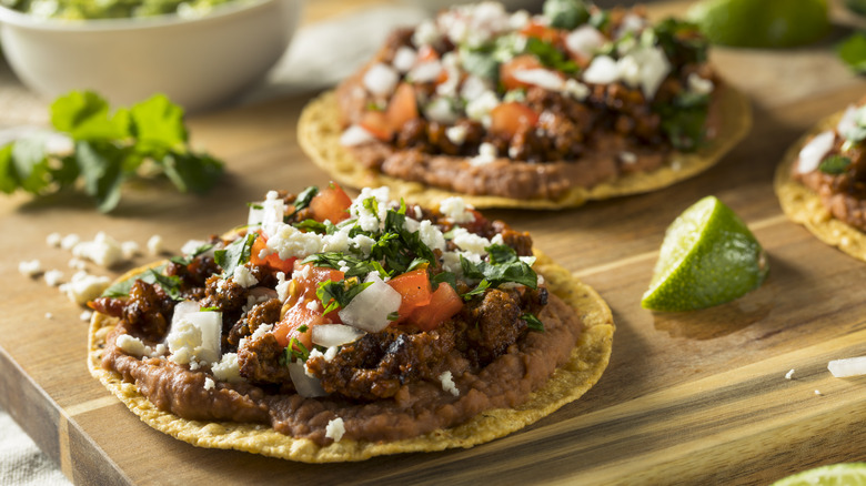 Tostadas with lime wedge