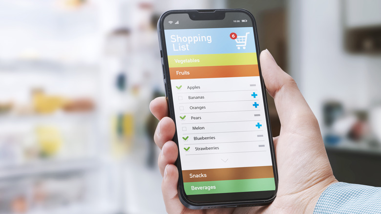 Someone using a grocery shopping app on their phone.