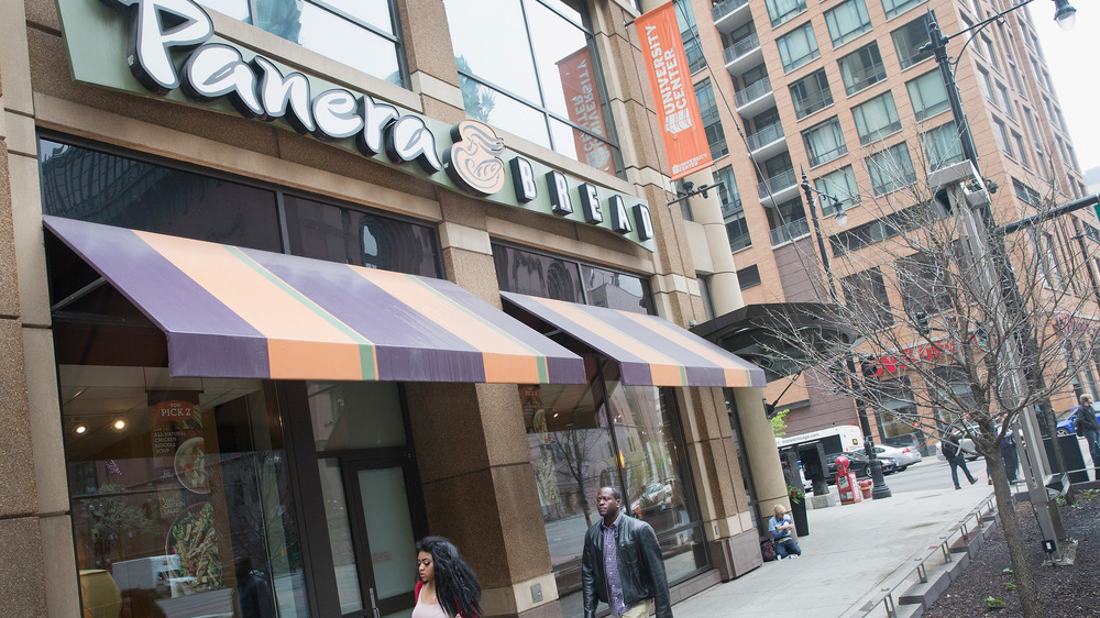 Panera bread with person on sidewalk