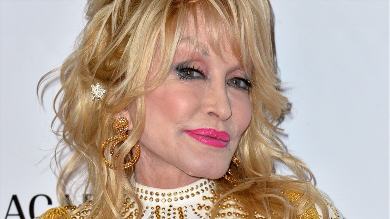 Dolly Parton with pink lipstick on
