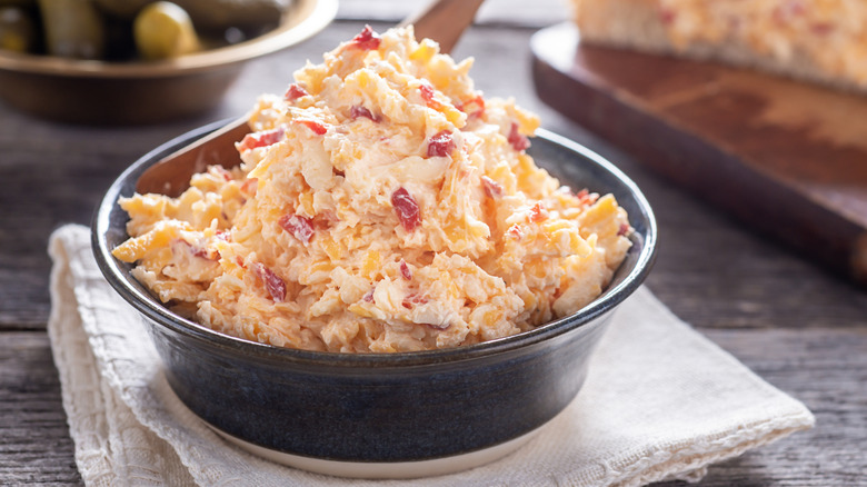 Bowl of pimento cheese on kitchen counter.