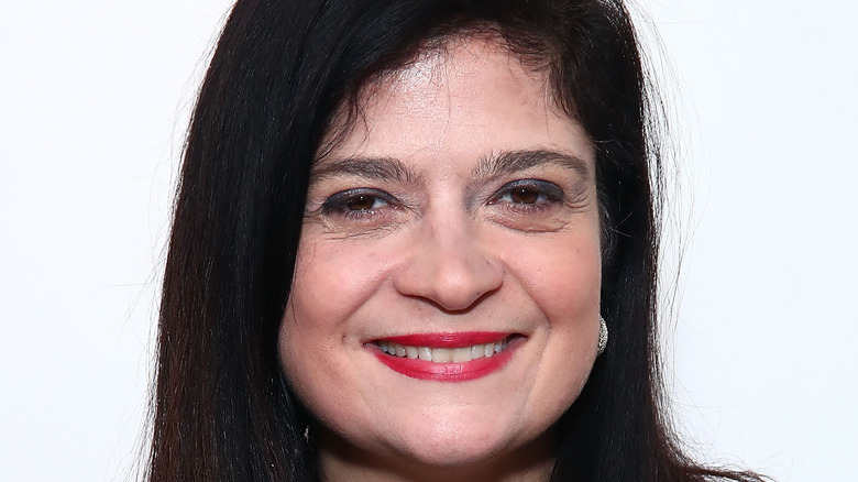 Alex Guarnaschelli smiling at event