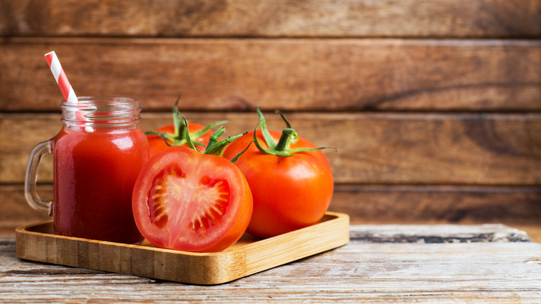 tomato juice next to tomatoes
